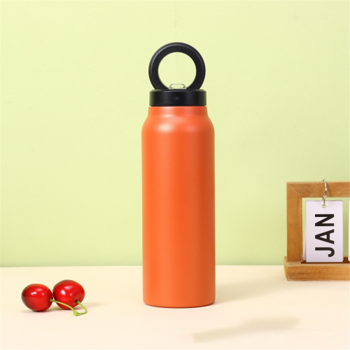 Bouteille d'eau isotherme orange avec support magnétique pour téléphone 1