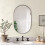Black Metal Oval Mirror 20 x 33 Inch 1