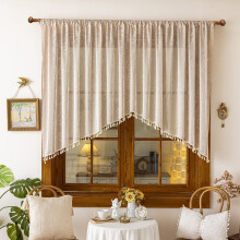 Green semi-sheer lace curtain valance with tassels and leaf
