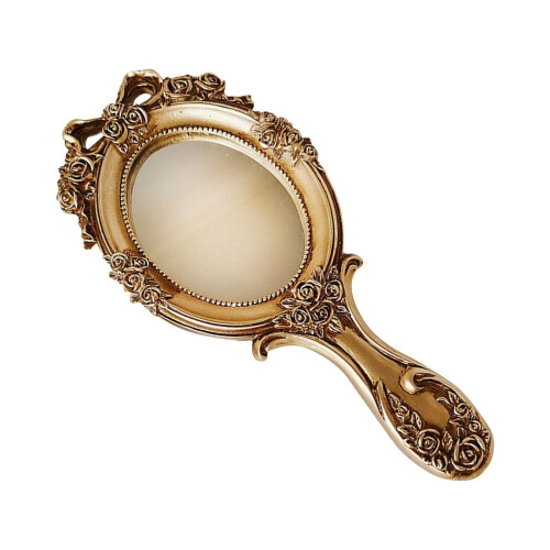 Vintage oval hand mirror with embossed floral design 1