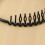 Cerchietto in plastica dentato nero per donna 8