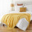 Gelbe Strickdecke mit Quasten, 130 x 230 cm 8