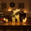 Pre-Lit Glittering Reindeer Decor with Gold Bell and 5