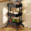 3-Tier Black Metal Utility Cart with Locking Wheels 4