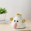 Ceramic Ghost Phone Stand with Kawaii Money Bag Design 1