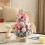 Pink 12-inch tabletop Christmas tree with ornaments and 1
