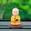 Solar-Powered Waving Monk Car Ornament 2