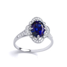(L) Jewelco London Ladies Rhodium Plated Sterling Silver Blue Oval CZ Shoulder Set Clover Halo Solitaire Cocktail Ring - GVR894