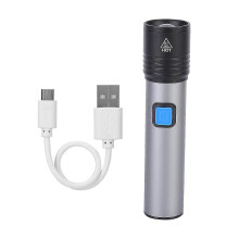 Lampe torche LED rechargeable USB avec zoom réglable, batterie intégrée, boîtier robuste en aluminium pour usage extérieur.