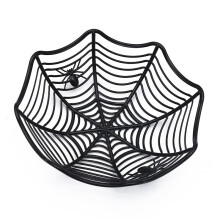 A black spider web-shaped plastic fruit and candy basket for Halloween, a table party decoration.