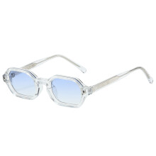 Kleine, polygonale Metall-Sonnenbrille mit UV-Schutz, transparentem Rahmen und blauen Gläsern