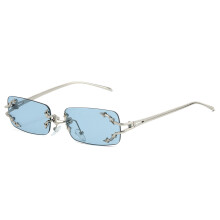 Randlose Sonnenbrille für Damen, silbernes Gestell, blaue Gläser