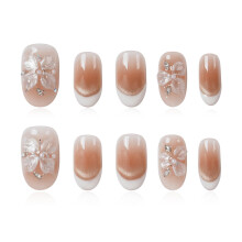 Tesytto kurze ovale Press-On Nägel, Nude Cat Eye Gradient mit weißem französischen Tipp & 3D Blume, wiederverwendbar