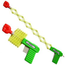 1pc Shooter Retractable Fist Shooter Trick Toy Funny Child Plastic Party Festival Gift Classic Elastic Telescopic Fist (Random Color)