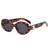 Trendy Celinn Selin Arc De Triomphe Sunglasses with Golden Logo - Oval Frame in Brown