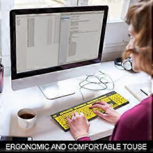 Teclado de gran visibilidad con teclas amarillas y negras de alto contraste para una lectura clara, diseño ergonómico para un