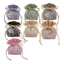 Kiristysnyörilliset karkkipussit 7 kpl nailon 13x10x0,5 cm lahjakassit makeispussit moniväriset