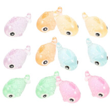 12 mini figuras de peces de resina que brillan en la oscuridad. Decoración luminosa.