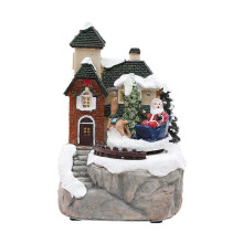 Decorazione natalizia luminosa a forma di casetta di neve in resina colorata, ideale per la scrivania.