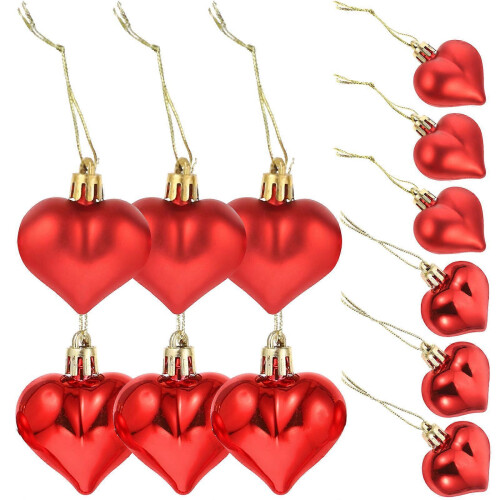 Decorazioni a forma di cuore rosso in plastica, set da 12 pezzi.