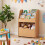 Houten kinderboekenkast met uitschuifbare lade 7