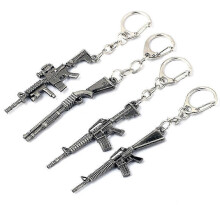 Brelocuri mini cu pistol, set 4 buc., pentru bărbați, pandantive cu inel de chei din metal argintiu, cu formă de pistol (4 modele
