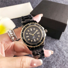 (Silver, gold, black) Ladies Silver Quartz Watch, Stainless Steel Band, Pink Dial Crystal Markers Pink-Orange Rotating Bezel Waterproof Wristwatch