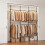 Adjustable Floor-to-Ceiling Clothes Rack, Black, 6 Rods 1