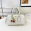 (White) Embossed Boston Pillow Bag Cherry Pendant Hand-held Cylindrical Bag 1
