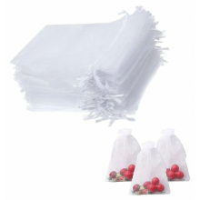 20 valkoista organzapussia, 10 x 15 cm kiristysnyörillä varustettuja lahjapusseja koruille ja hääjuhlille