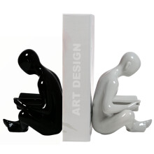 EstiloHome Buchstützen Set Figuren Schwarz und Weiß – dekorative Buchstütze für Regal und Bücherwand