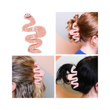 Haarclip met lachend gezichtje en wormmotief voor vrouwen en meisjes, stijlvol en praktisch.