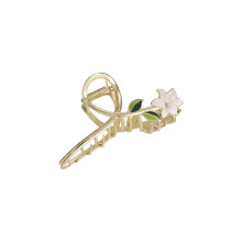 Bloemvormige haarclips, metalen gouden haarbanden, haaraccessoires, haarspeldjes met klauwen, haarversieringen.
