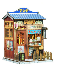 Kerstcadeau: miniatuur bouwpakket voor een scène, houten creatieve hut in speelstijl.
