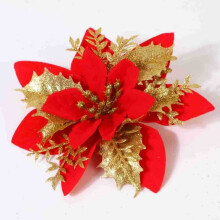 Decorazione natalizia a tre strati con effetto polvere dorata simulata e fiori per creare un'atmosfera natalizia.