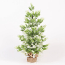 Mini-Weihnachtsbaum im Schneefall-Stil mit weißen Spitzen, weichen Kiefernnadeln und kleinem Tischaufsatz